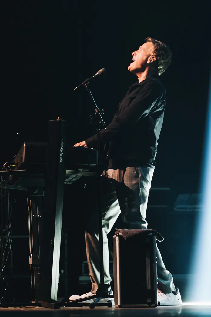 Michael W. Smith singing on stage